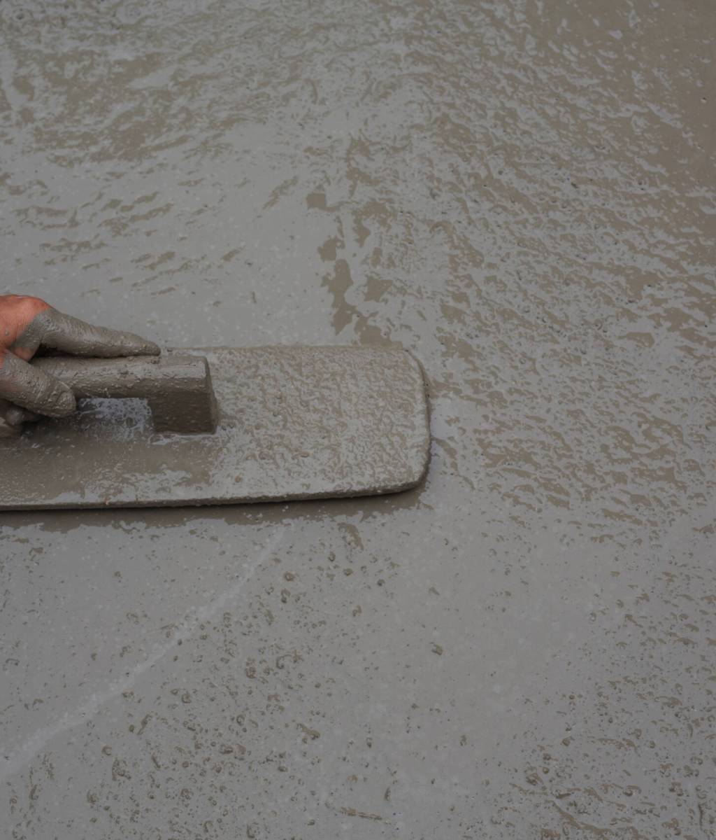 Construction technicians are mixing cement, stone, sand for construction.