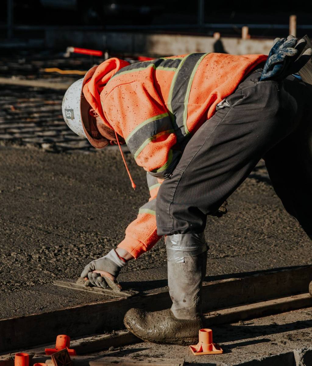 The workers in the construction site